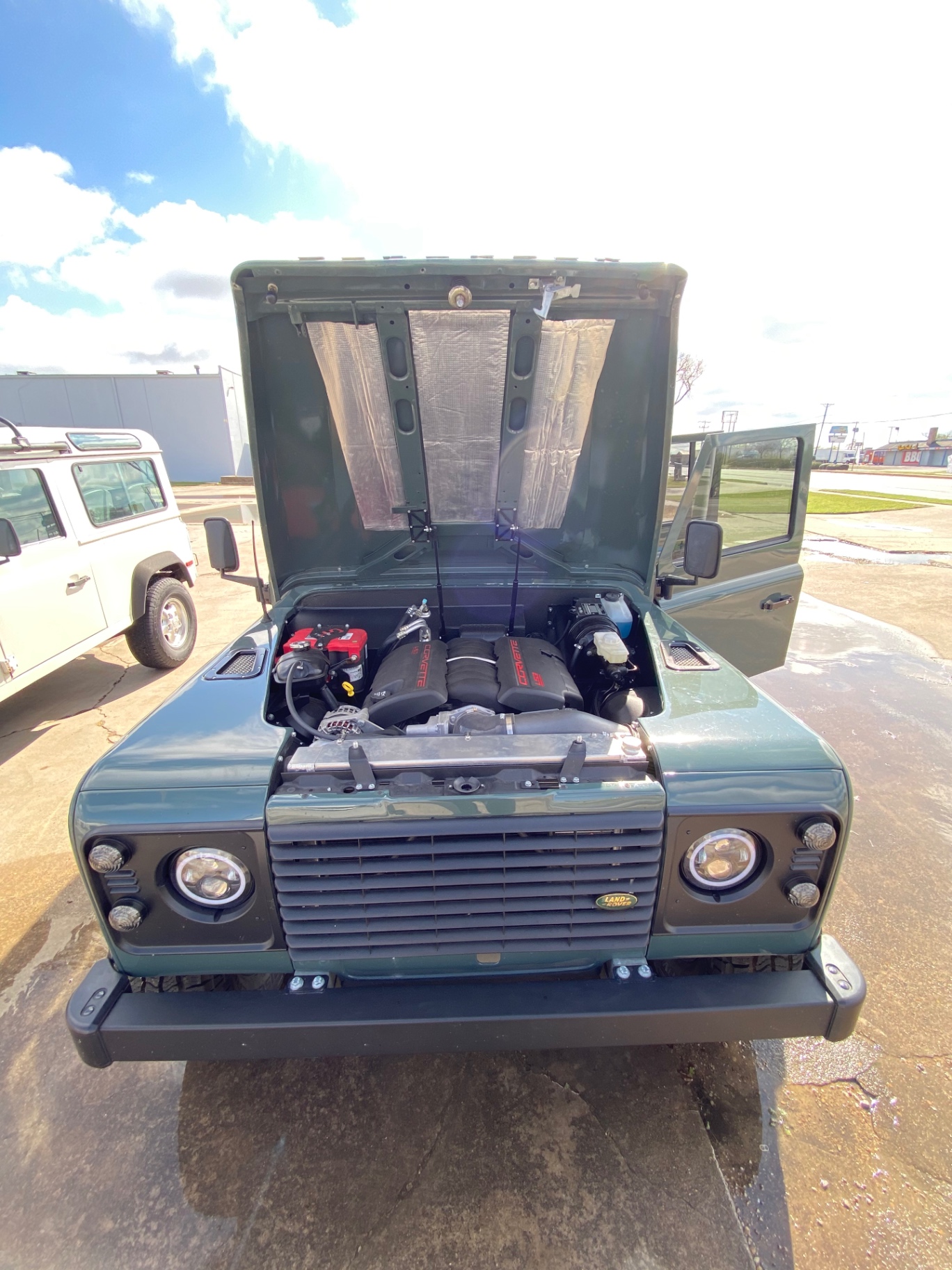 Corvette LS V8 installed in a Keswick green Defender 110 engine bay