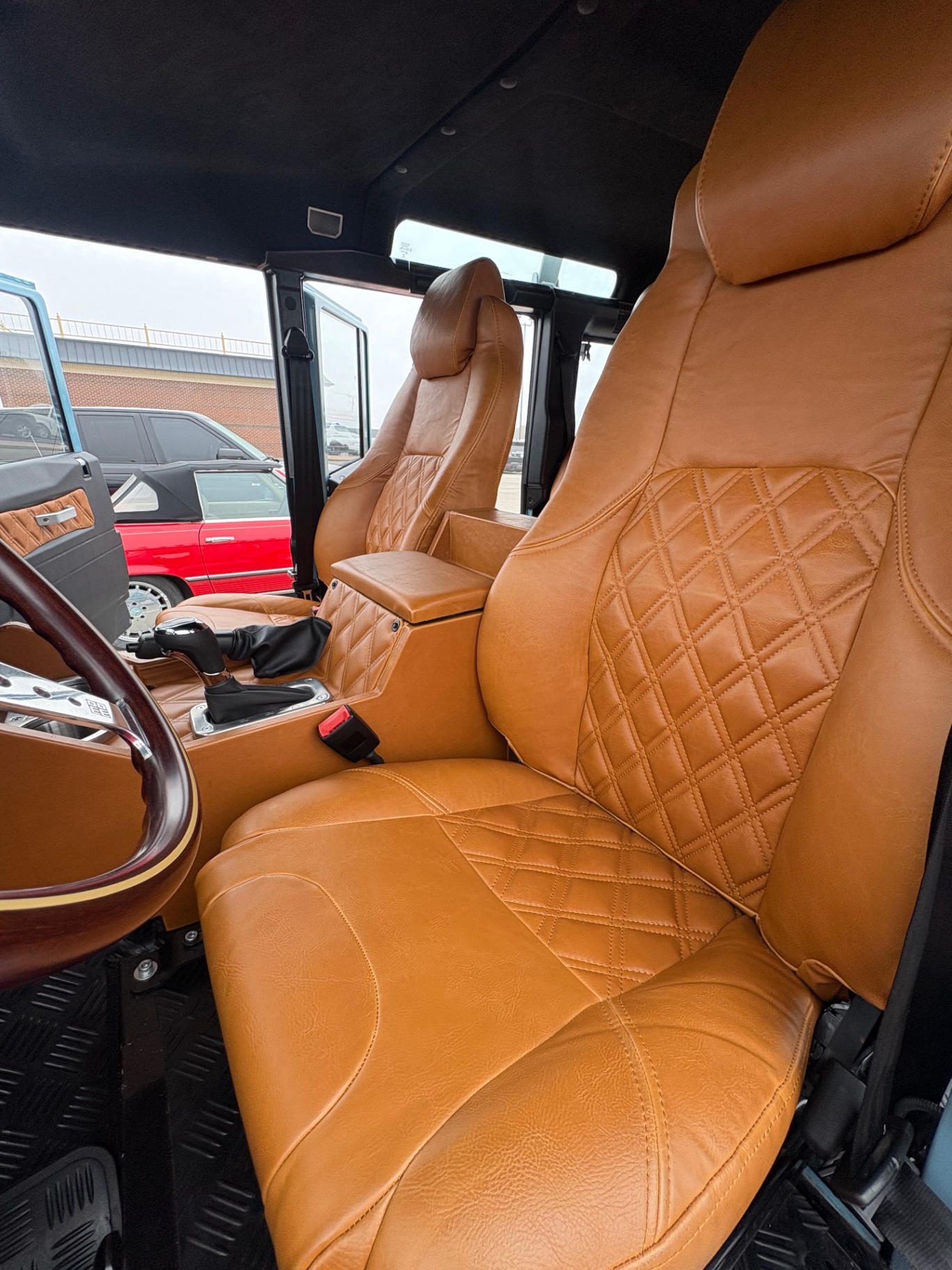 Tan diamond-stitched leather Defender seats