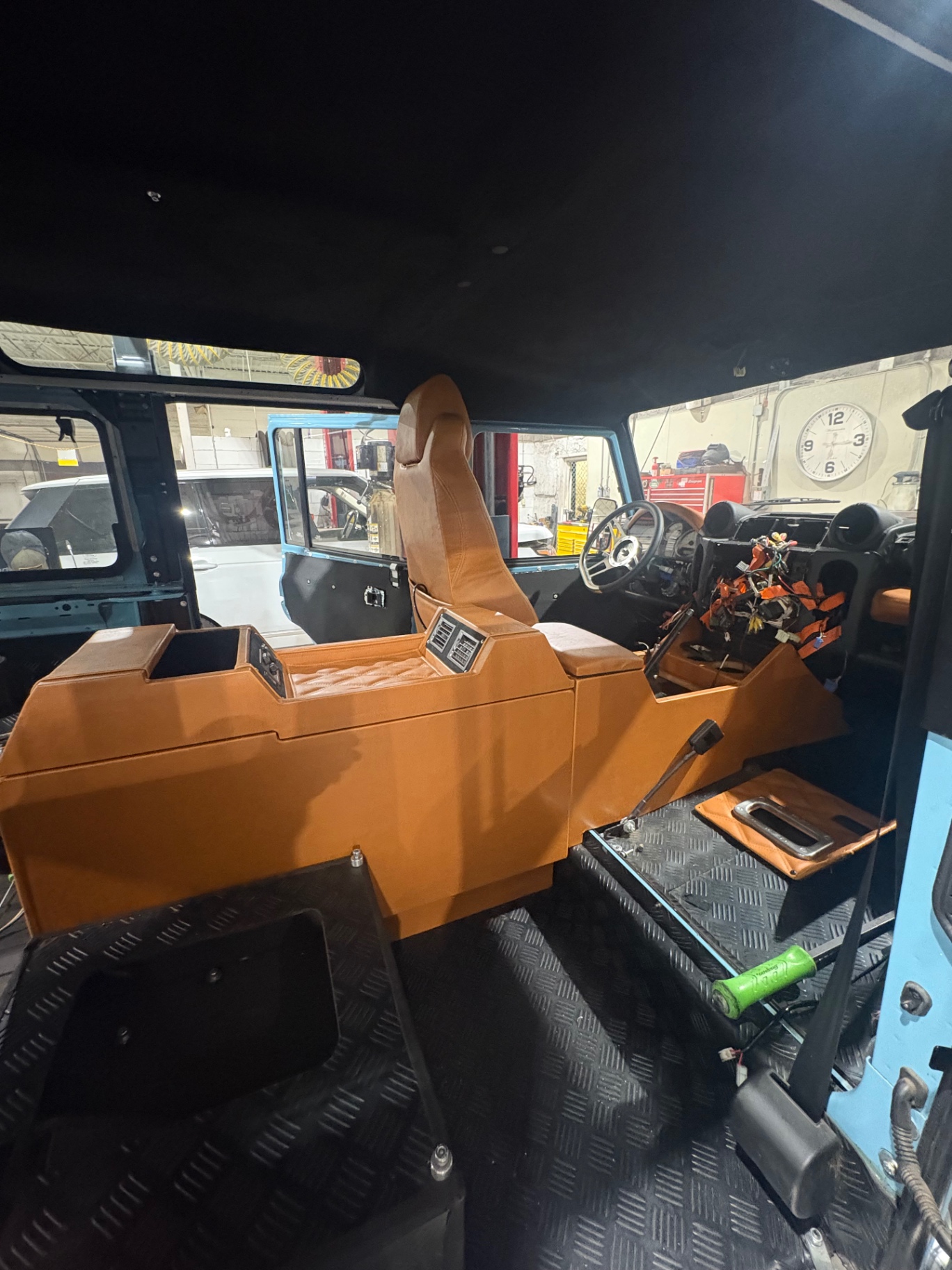 Custom tan leather center console and dash build in progress